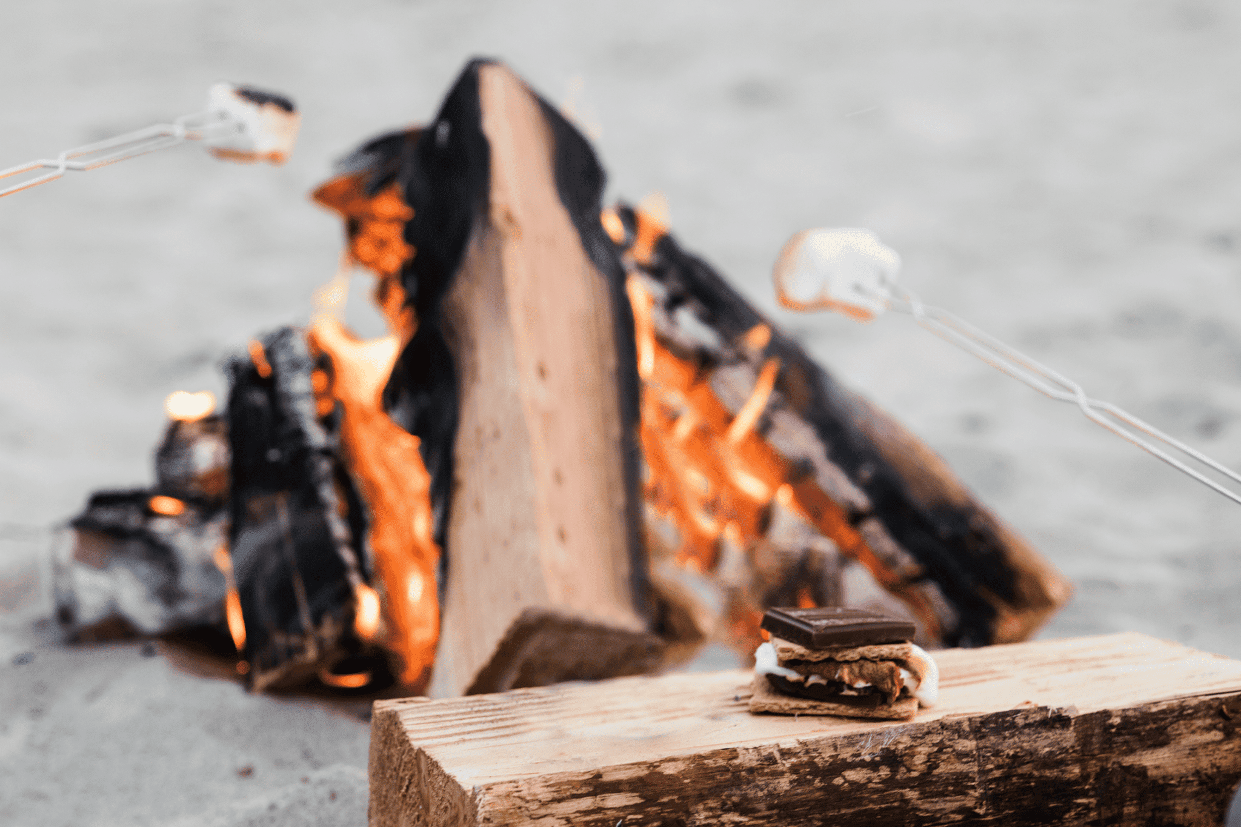 A close up of a camp fire and S'mores at Inn at Cape Kiwanda