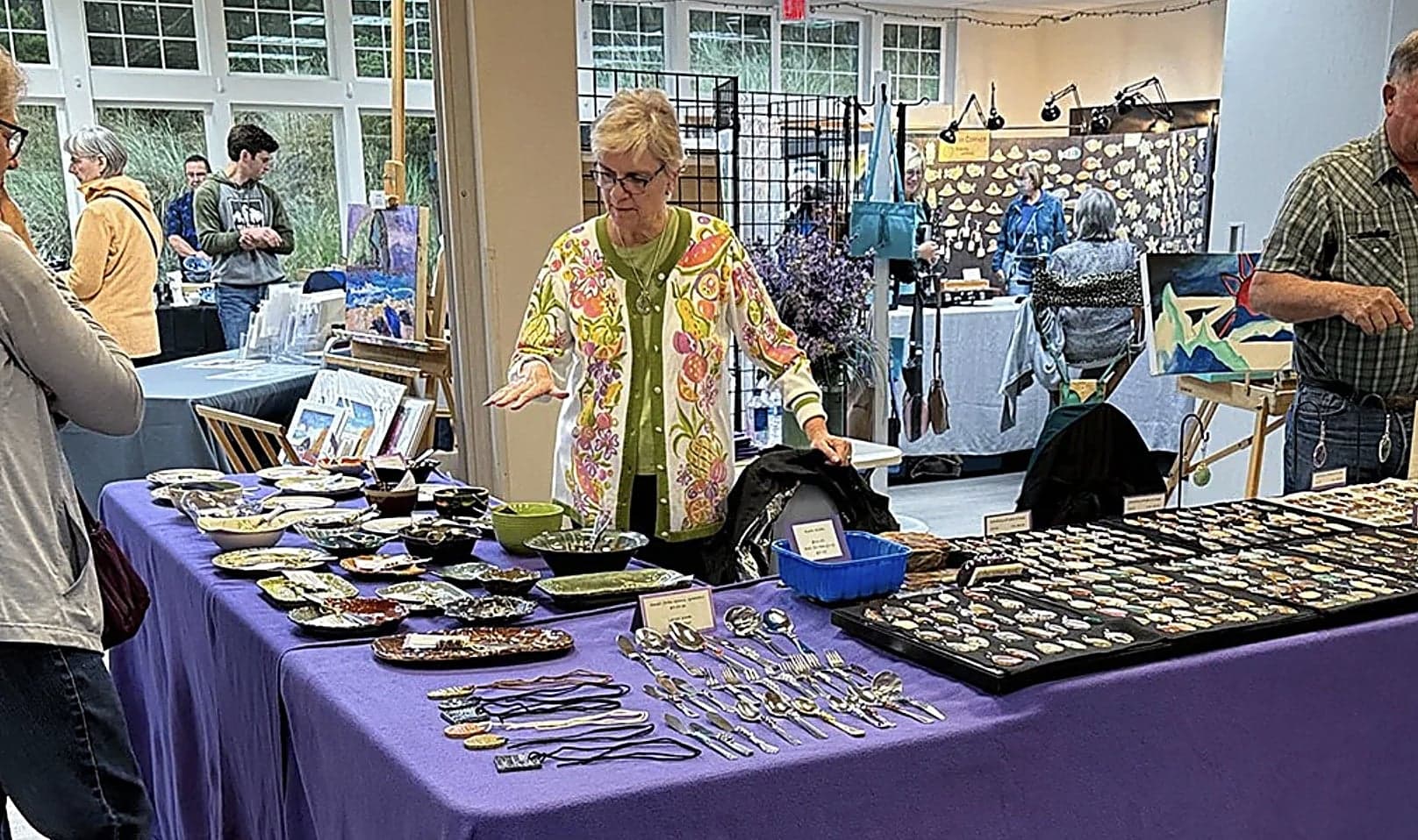 Handcrafted pottery and jewelry booth at Nestucca Valley Artisans art festival, Inn at Cape Kiwanda, Pacific City, Oregon Coast