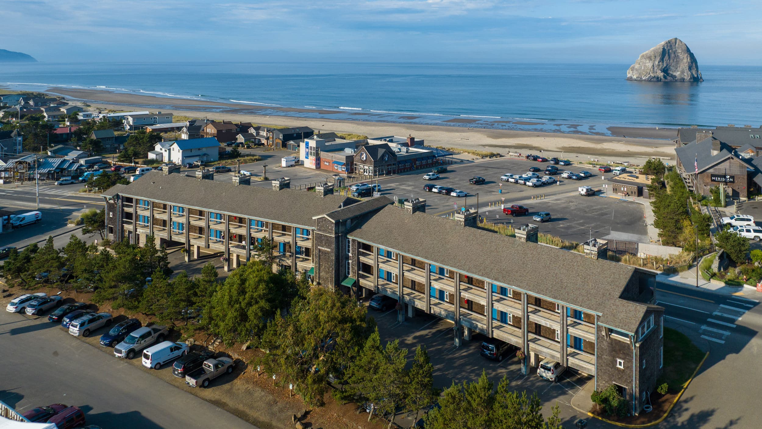 Aerial view of the Inn at Cape Kiwanda with Haystack Rock and the beach, Pacific City, Oregon Coast