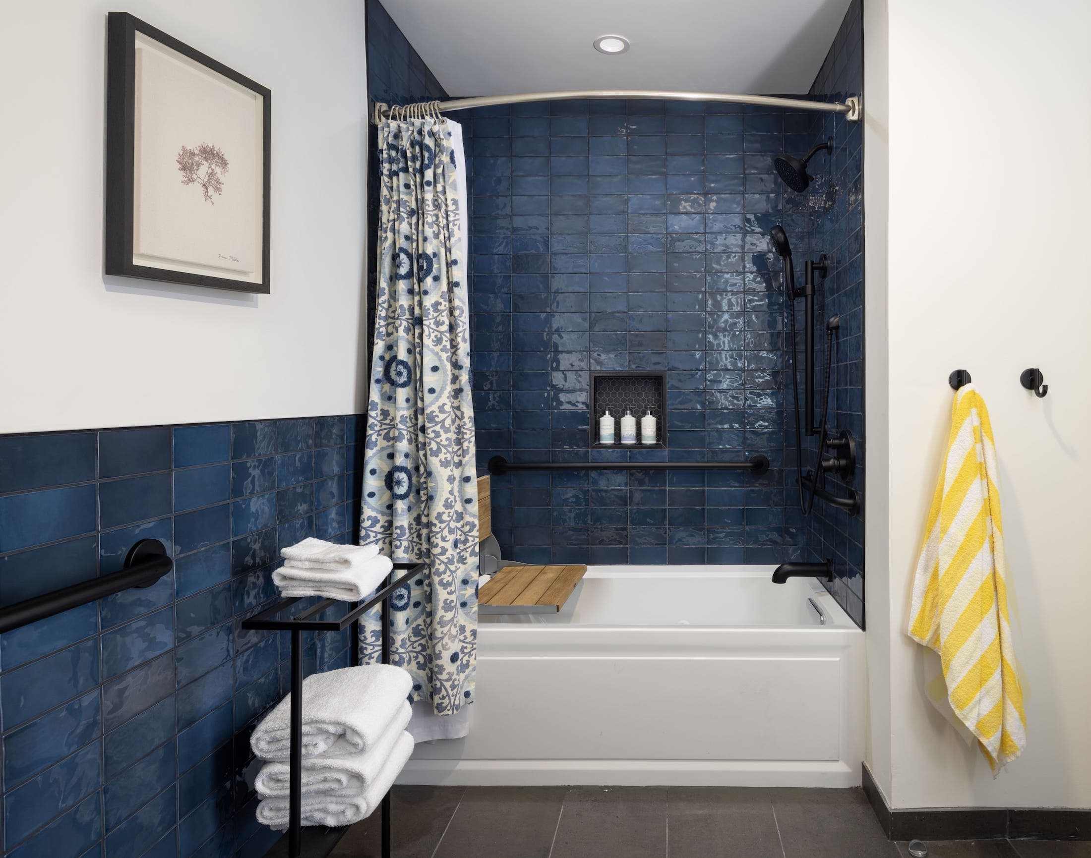 Inn At Cape Kiwanda Top Floor Two Queens Accessible Bathroom with support bars in the tub