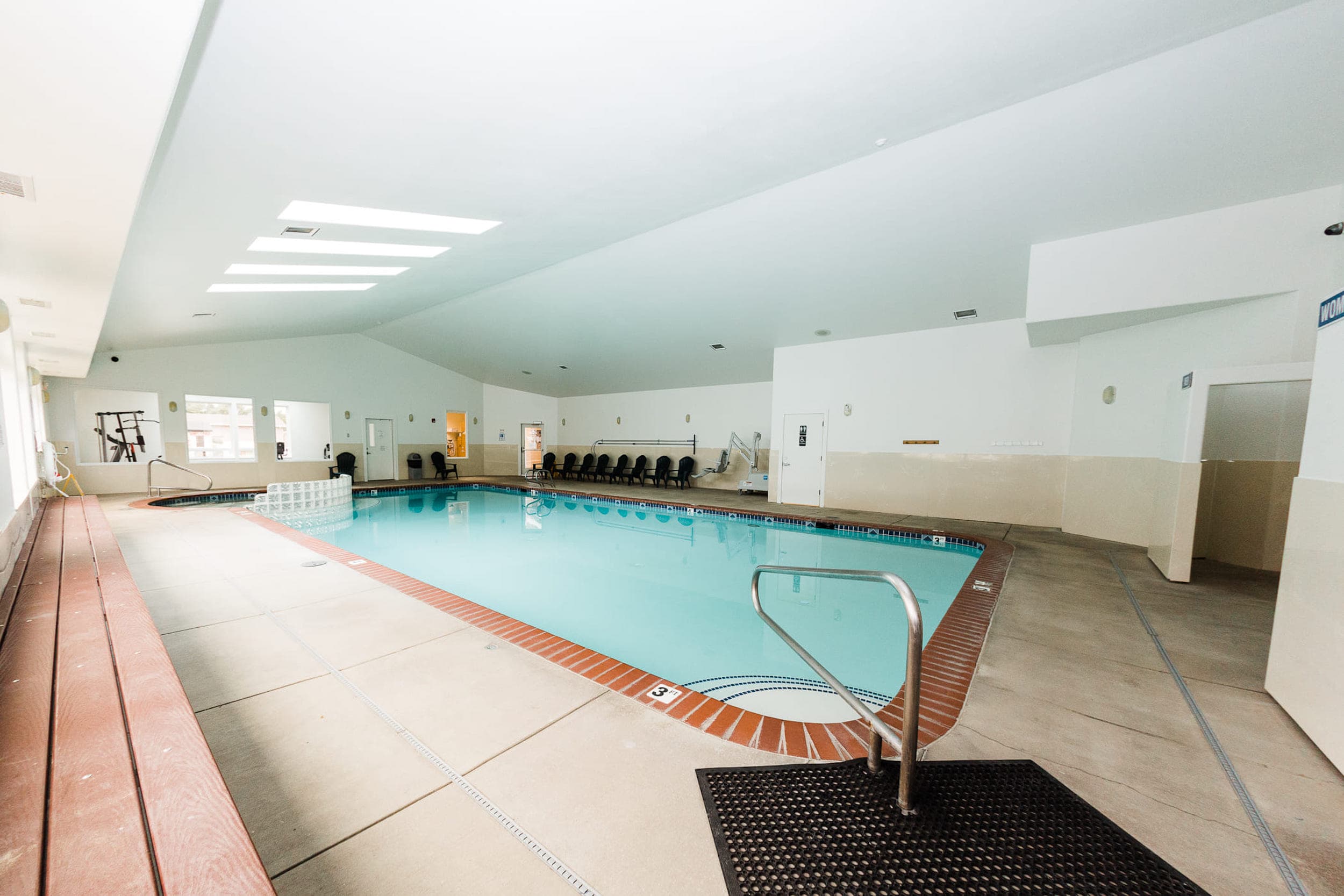 Pool And Hot Tub With Accessible Lift Chair at Inn at Cape Kiwanda